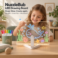 NuzzleBub LED Drawing Board used by a child